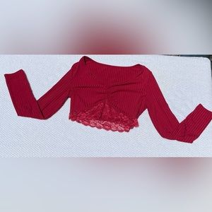 A large , really stretchy . Burgundy/ Red with lace on bottom